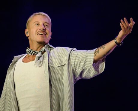 FRANCE-MUSIC-FESTIVAL-HIPHOPUS rapper, singer, dancer and DJ, Benjamin Haggerty, known as Macklemore, performs at the Goldencoast Rap Festival in Corcelles-les-Monts, near Dijon, central-eastern France, on August 30, 2026. (Photo by ARNAUD FINISTRE / AFP via Getty Images)