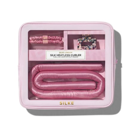 A pink Silke heatless hair curler kit in its case