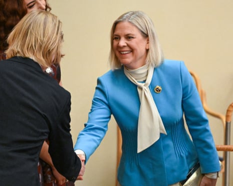 Sweden’s Social Democratic party leader Magdalena Andersson shakes hands as she attends the opening of the Swedish parliament last month.