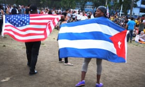Rolling Stones fans sporting US and Cuban flags at the Ciudad Deportiva ground.