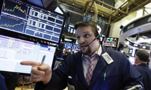 Trader Michael Milano on the floor of the New York Stock Exchange.