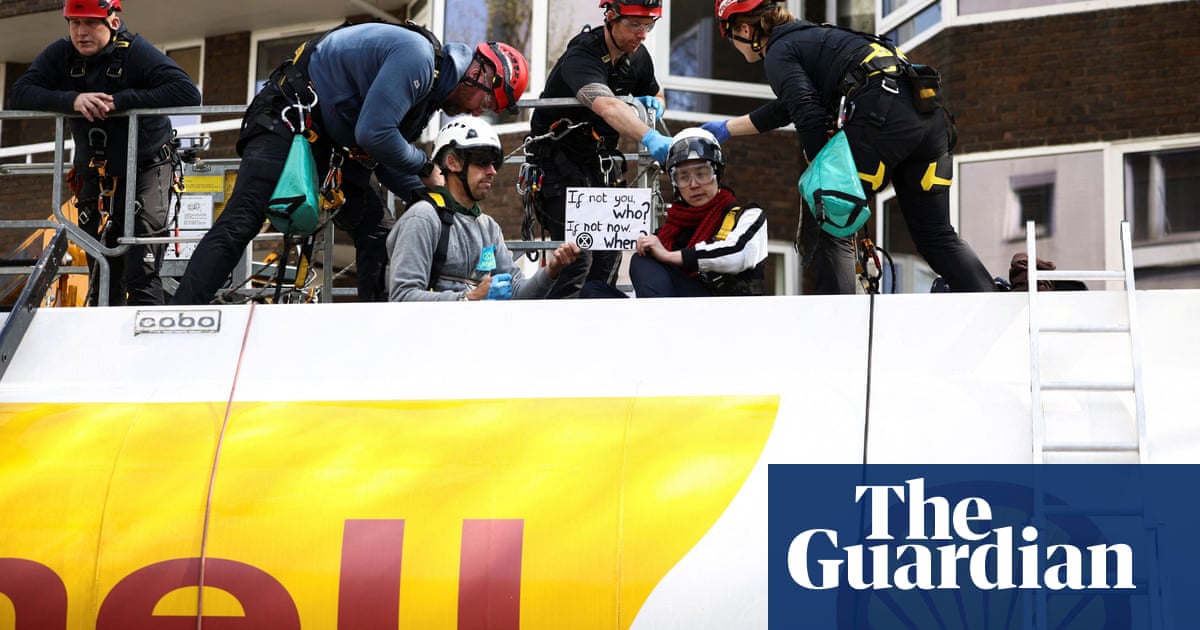 XR activists including Olympians climb on oil tanker in London