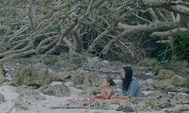 Trauma counsellor Poh Lin Lee with her daughter in The Island of Hungry Ghosts.