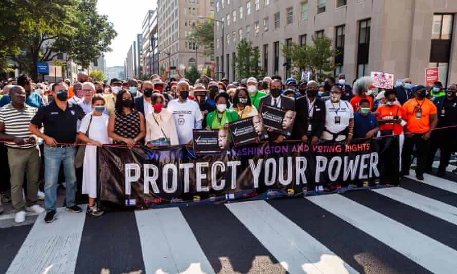 The Rev Al Sharptonm Martin Luther King III and others await the beginning of the march on the 58th anniversary of the March on Washington.