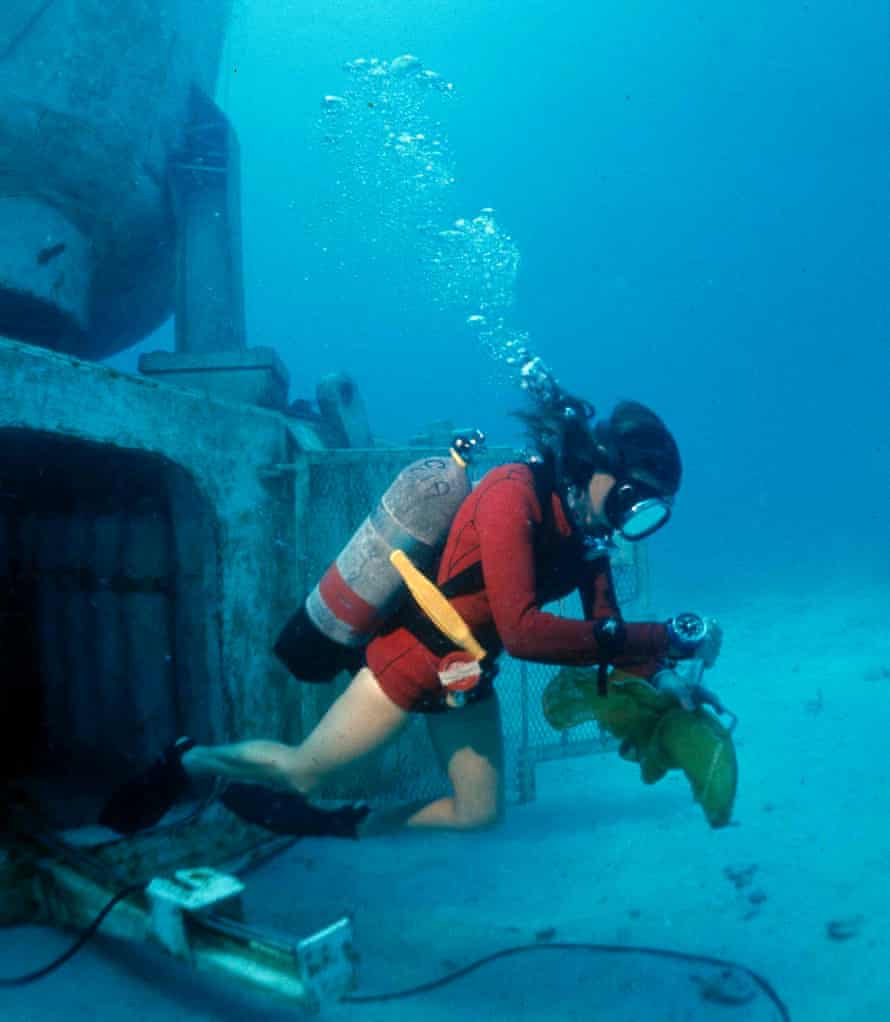 Sylvia Earle scuba diving outside an underwater lab in 1970.