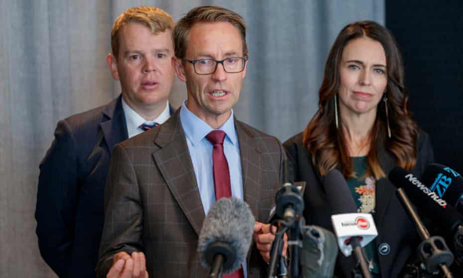 Minister for Covid-19 Response Chris Hipkins (L), Director General of Health Dr Ashley Bloomfield speaking and New Zealand Prime Minister Jacinda Ardern