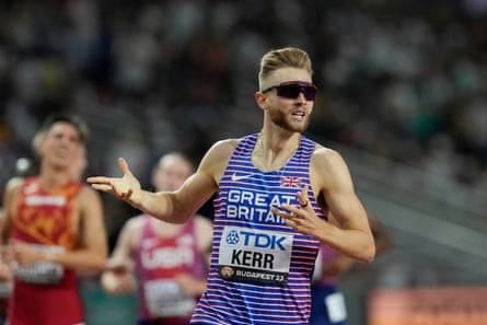 Josh Kerr starts to celebrate after winning the 1500m at the 2023 world championships in Budapest.
