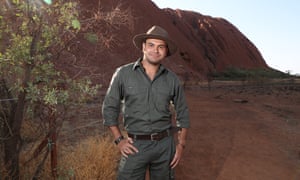 Tjiangu Thomas at the base of Uluru.
