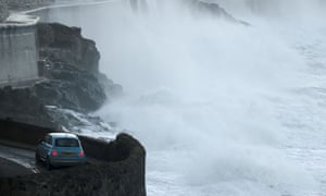 Large waves and strong winds hit in Porthleven, Cornwall. Photo: REUTERS/Tom Nicholson