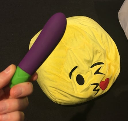 Eggplant emoji vibrator known as the emojibator on show at Emojicon in San Francisco