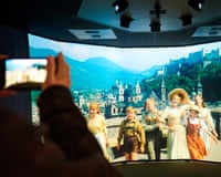 A shot from The Sound of Music, with Julie Andrews singing with the von Trapp children