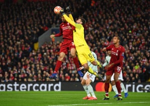 Poor communication means Liverpool goaltender Alisson and defender Fabinho go for the same ball.