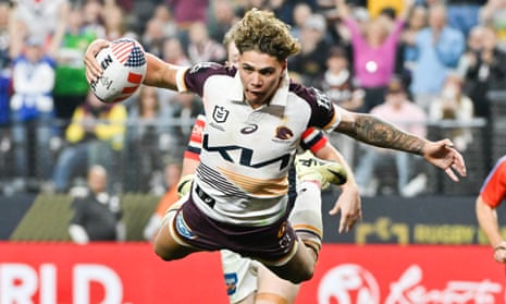 Broncos star Reece Walsh scores a spectacular try during the match against the Sydney Roosters as NRL invades the USA at Allegiant Stadium in Las Vegas.