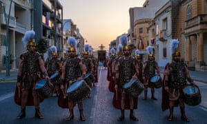 Żebbuġ, Malta ‘Men dressed as Roman soldiers lead the procession of the cross through the streets at dusk for Good Friday.’