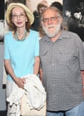 Oates in hat and a blue top, Gross in a checked shirt, standing together