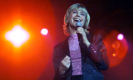 Olivia Newton-John sings at her Greatest Hits Live concert in Hong Kong in 2000.
