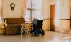 A resident sits doing puzzles at a care home in Vauxhall