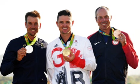 Justin Rose, centre, with Henrik Stenson, left, and Matt Kuchar at Rio 2016.