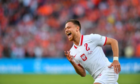 Matty Cash of Poland celebrates scoring against the Netherlands in June.