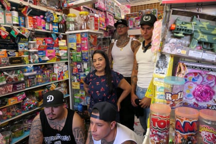 Large dipper, boxing and bikers in LA: Wembley to Soweto initiative 2022 – photograph essay | Pictures 37 Shop Security – a store trader keeps a careful eye on her stock