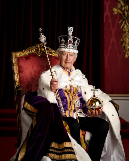 The king was photographed in full regalia, wearing the imperial state crown.