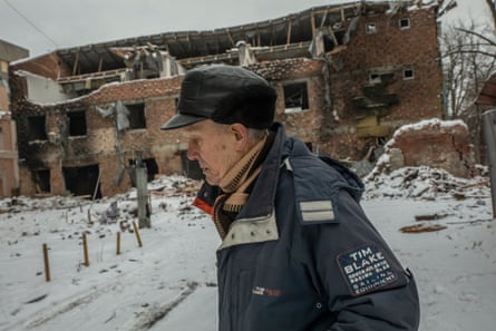 Yurii Ivanovich, 84, on his road in central Kharkiv which was hit on 30 December by Russian missiles.
