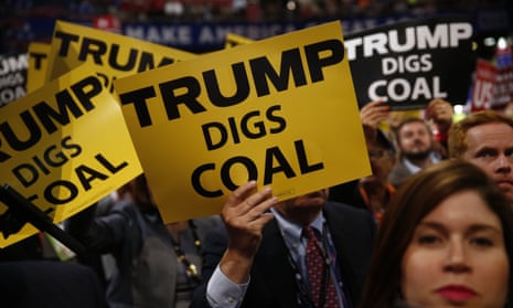 Republican national convention delegates hold signs reading ‘Trump digs coal’ in 2016