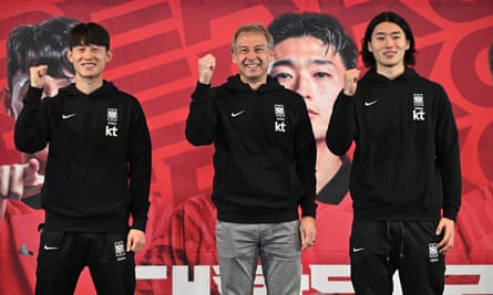 Jürgen Klinsmann, pictured with South Korea players Lee Jae-sung (left) and Cho Gue-sung (R) begin their Asian Cup assault on Monday.
