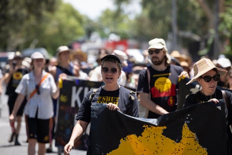 Invasion Day protesters march through the streets of Alice Springs, Australia