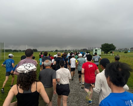 Runners taking part in a parkrun in Futakotamagawa, Tokyo.