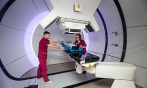 Radiographers David Kirk (left) and Melissa Bentley (right) demonstrate the NHS's new proton beam kit.