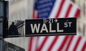 The Wall Street sign is pictured at the New York Stock exchange (NYSE) in the Manhattan borough of New York.
