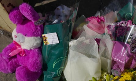 Floral tributes left near to the scene in Boston after a nine-year-old girl died from a suspected stab wound.