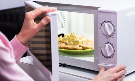 Person opening microwave