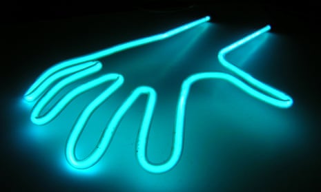 A neon sculpture of a hand by Nick Malyon.