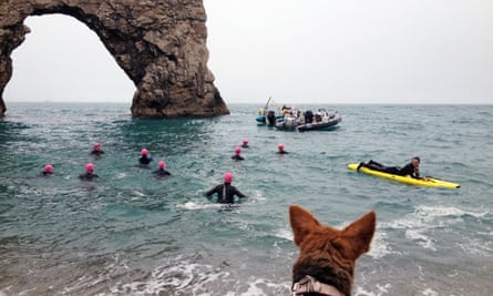 Open water swimming at Durdle Door, UK