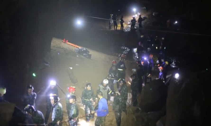 Rescue workers at the Tham Luang cave complex in Chiang Rai.