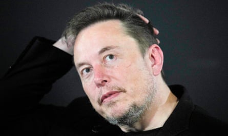 Head and shoulders shot of Elon Musk wearing black
