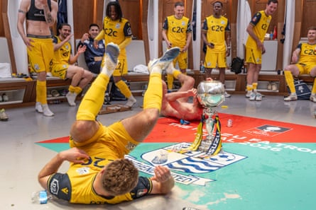 Dressing-room celebrations for Southend with the trophy.