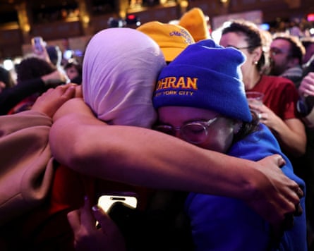 Supporters celebrate as initial projections of Mamdani’s win are declared, at Brooklyn Paramount in New York on 4 November.