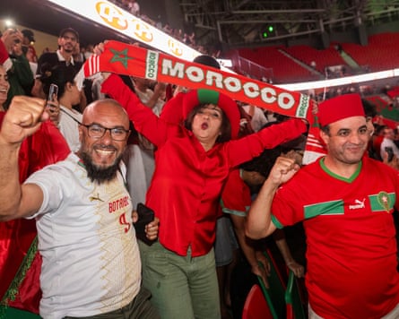Moroccan fans celebrate after their team won on penalty kicks in the World Cup round of 32.