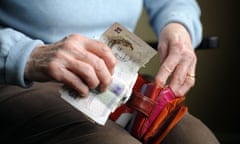 pensioner with cash and wallet