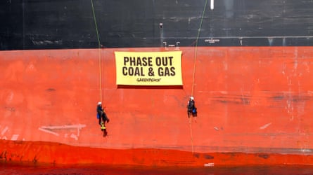 Greenpeace activists scaled a coal ship at Newcastle on Sunday.