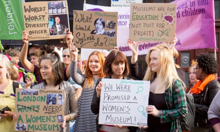 Young women protest outside the Jack the Ripper museum on Tuesday.