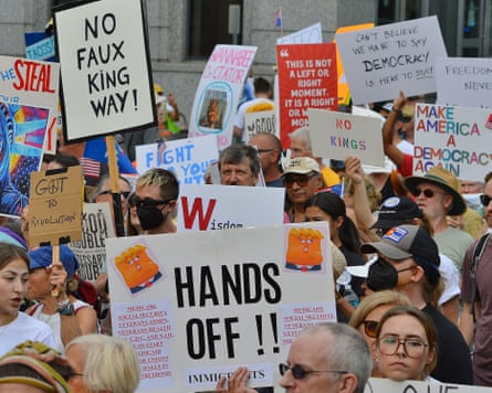 anti-trump protesters with signs