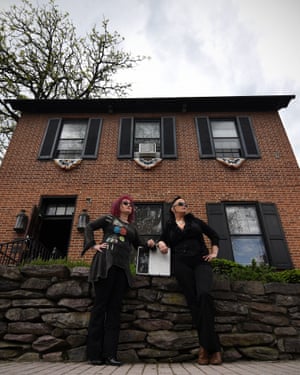 Jenny Thomas (left) and Brigid Goode, Gettysburg ghost hunters, stand in front of Farnsworth House.