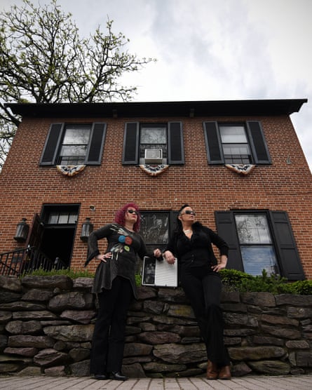 Jenny Thomas (left) and Brigid Goode, Gettysburg ghost hunters, stand in front of Farnsworth House.