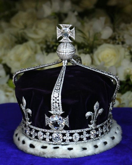 The queen mother’s crown sits on top of the coffin during her funeral in 2002.