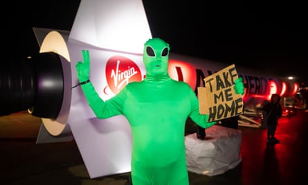 Adrian Grint, dressed as an alien, was one of the visitors at Spaceport's inaugural Virgin Orbit rocket launch from Newquay Airport in Cornwall.