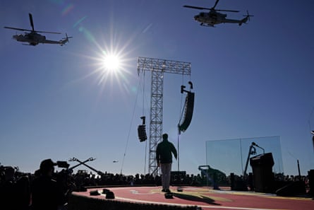 JD Vance walks on stage to deliver remarks at the event at Camp Pendleton.